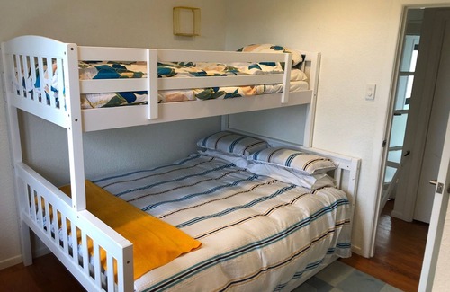 Whangateau House | Cute kiwi bach and separate modern cottage with sea views