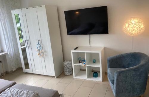 Holte-Spangen Apartment | CUXTräumer - Stilvolle Ferienwohnung für Paare - WLAN, privater Parkplatz und Grill - Ruhige Lage mit Gartenblick, Nordseestrand und Wernerwald fußläufig, Cuxhaven- Sahlenburg