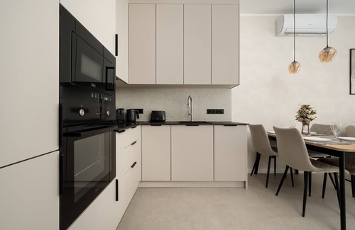 Wroclaw City Center Apartment | Czysta 4 Wrocław | Beige Apartment with Garden, Desk and Air Conditioning