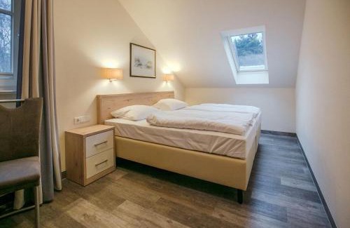 Binz Apartment | Dünenpark Binz - Komfortplus Ferienwohnung mit 2 Schlafzimmern und Balkon im Dachgeschoss 032