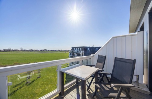 Wremen Apartment | Dachgeschosswohnung in Strandnähe mit Sauna, Zwei Balkonen und Tollem Ausblick