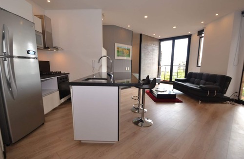 Calle 100 Apartment | DAISY B - 1 Br. Executive Apartment with balcony & squash court