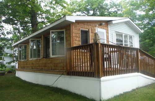 Curtis House | Darling Park Model Trailer downtown Curtis with views of South Manistique Lake