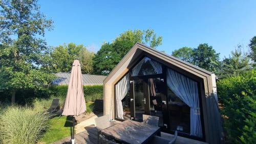 Hulshorst Ski Chalet | Das Holland Beachhouse, modern eingerichtet, in schöner Lage am Veluwemeer, inklusive Garten, Terrasse am Wasser, Parkplatz und WLAN