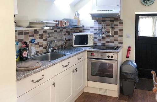 Kniveton Cottage | Dating back to 1750 and retaining much of its character and charm.