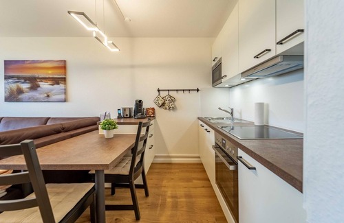 Dorumer Neufeld Apartment | De Wisch - Newly renovated vacation apartment with pool and sauna