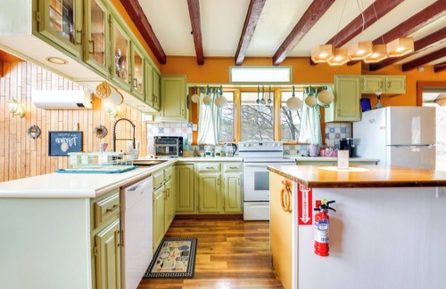 Vernon Apartment | Deck, Mountain Views: Colorful Retreat in Vernon!