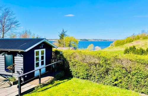 Hjarbæk House | Dejligt sommerhus med udsigt over fjorden