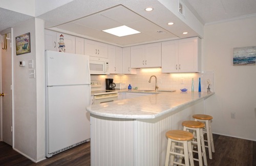 North Ocean City Condo | Delightful Ocean Block Condo in an Uptown Location Walking Distance To Northside Park that has an Elevator and Two Parking Spaces that is Only a Short Walk to the Beach!