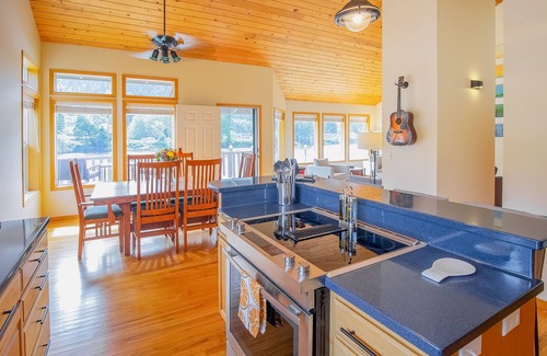 Mapleton House | Delightful riverfront home with dock, game room, fast WiFi, kayaks & grill