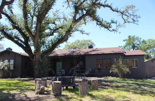 Leakey House | Deluxe 4 Br Ranch House is located near our pool and walk path to The Springs.