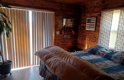 Fittstown House | Deluxe log home with 57 acres on 1/2 mile of the SO. Canadian river. Sleeps 6.