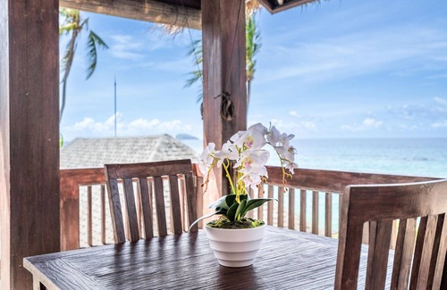 Candi Dasa Apartment | Deluxe Room with Balcony and Ocean View | The Village of Angels Resort