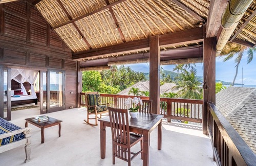 Candi Dasa Apartment | Deluxe Room with Balcony and Ocean View | The Village of Angels Resort