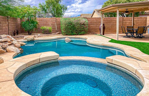 Apache Junction House | Desert charmer with enclosed yard, heated pool, smart TVs, W/D, & full kitchen