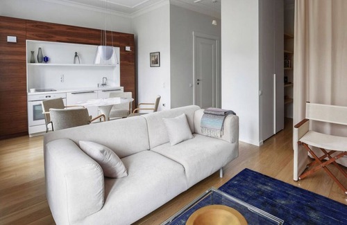 Liberty Avenue Apartment | Design Central Studio Apartment with Balcony by Hostlovers