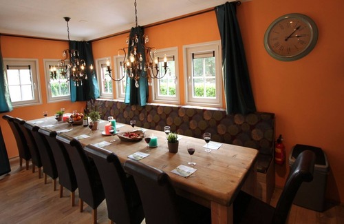 De Bult Villa | Designed home with bedstead surrounded by forest