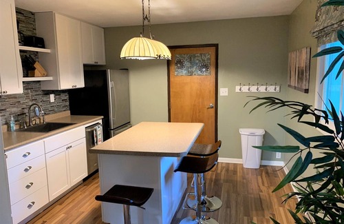 Farmington House | Designer Getaway is a fully remodeled house close to downtown.