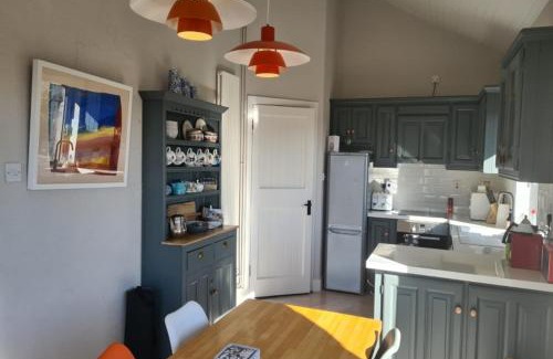 Ballyconneely House | Detached cottage overlooking lake in Connemara