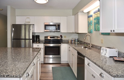 Rehoboth by the Sea House | Dewey Beach 4BR Condo Ocean Block w/Parking, Outdoor Shower