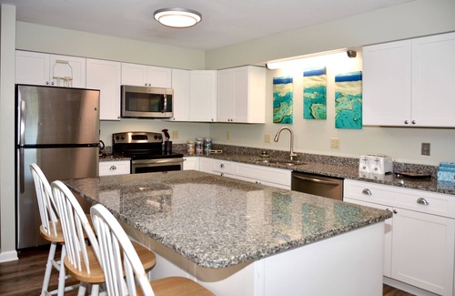Rehoboth by the Sea House | Dewey Beach 4BR Condo Ocean Block w/Parking, Outdoor Shower