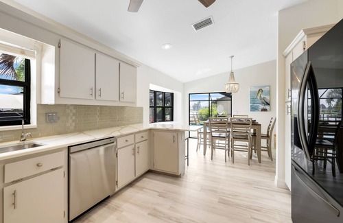 Lochmoor Waterway Estates House | Direct Gulf Access Newly Renovated Waterfront Pool Home Retreat