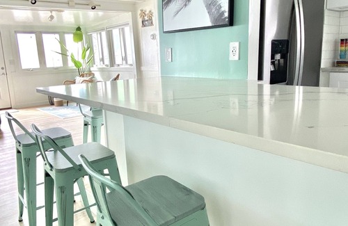 Milford House | Direct Waterfront "The Palms" Beach House
