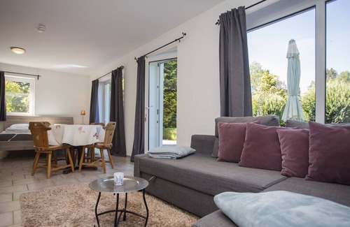 Elkeringhausen Apartment | Directly adjacent to hiking trails in a wooded area with mountains and a small lake