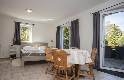 Elkeringhausen Apartment | Directly adjacent to hiking trails in a wooded area with mountains and a small lake