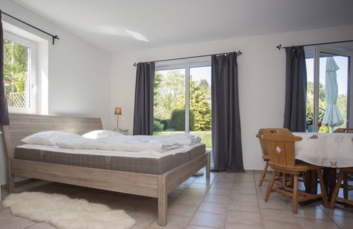 Elkeringhausen Apartment | Directly adjacent to hiking trails in a wooded area with mountains and a small lake