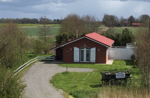 Nordholz House | Directly behind the dyke. In the midst of nature. Year of construction '13, W-LAN, TV, ground floor