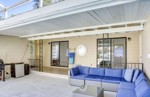 Cypress Gardens House | Discover Little Haven, a 3BR/2BA vacation home in Winter Haven with a heated pool, full amenities, and prime location—just 3 miles to LEGOLAND, 30 miles to Disney, and minutes from lakes, scenic trails, and family attractions.