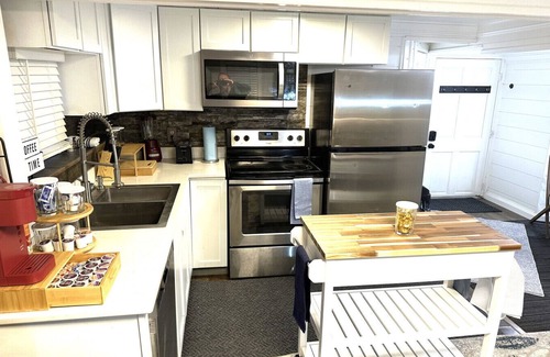 Moorhead Apartment | Discover the Secret Hot Tub Haven Hideout with King Bed & Luxe Linens at an affordable price.