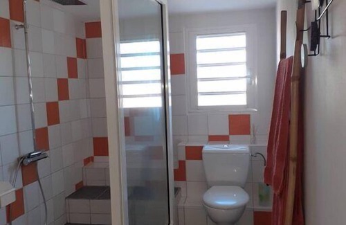 Manapany-les-Bains Apartment | Discover this adorable studio in a charming "ti coin" in the heart of a tropical garden.