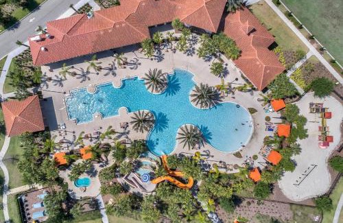 Loughman House | Disney Themed Home with PRIVATE HEATED POOL and Community Water Park
