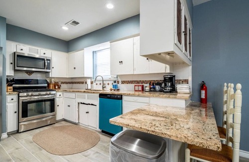 Richardson House | Dive Into Fun: Pool House with Grill + Game Room