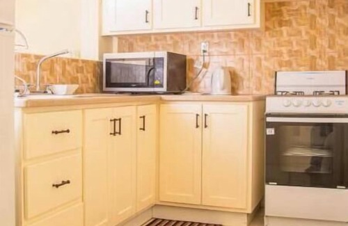 Saint Peter Parish Apartment | Doc's Paradise Red Apartment