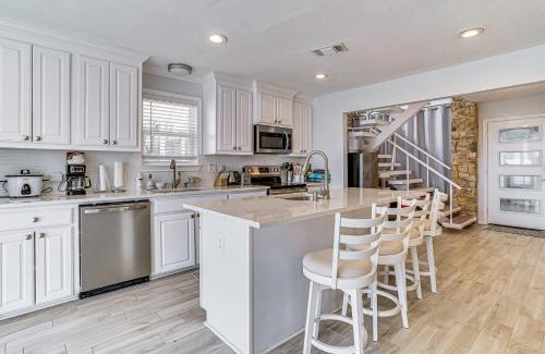 Runaway Bay House | Dock and Fire Pit Riverfront Runaway Bay Retreat