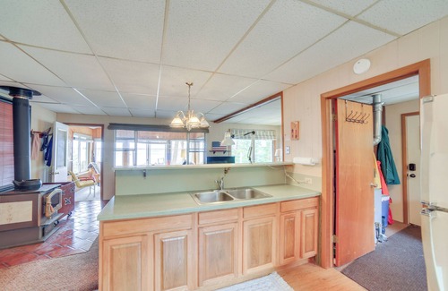 Gould City Cottage | Dock & Fire Pit: Lakefront Cottage in Gould City!