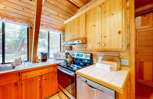 Tahoe Pines House | Dog-friendly A-frame cabin with 2 decks & fireplace - walk to the beach