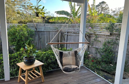 Arrawarra Headland Apartment | Dog friendly apartment close to beaches. Own private yard, garden and 2 decks.