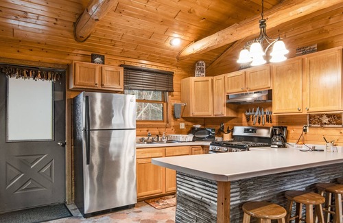 New Lisbon Cabin | Dog-friendly cabin with gas fireplace, firepit, porch, & shared pond access