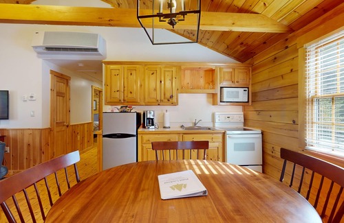 Northport Cabin | Dog-friendly cabin with kitchen, firepit, AC, gym, ping-pong & fun awaits