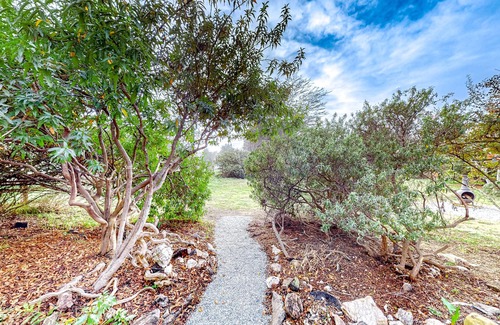 Cleone House | Dog-friendly, eco-conscious home with great yard & EV charger, near the beach