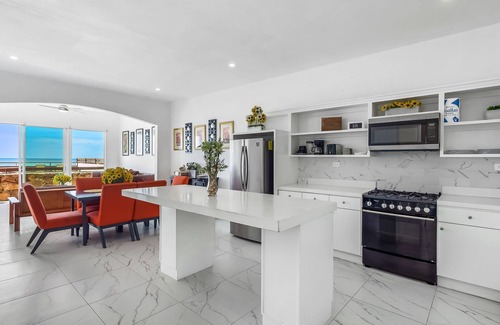 La Paloma House | Dog-friendly home with partial ocean view, heated pool, rooftop terrace