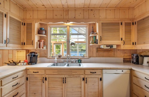 Land O Lakes House | Dog-friendly lakefront home with lake views, sauna, dock, firepit - near skiing