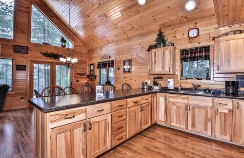 Eagle River House | Dog-friendly lakefront lodge with firepit, dock, & gas fireplace
