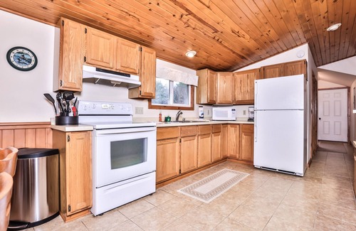 Three Lakes Cottage | Dog-friendly lakefront cottage with private dock, firepit, grill & washer/dryer