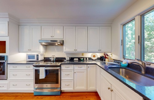 Falmouth House | Dog-friendly, lakefront home with roof deck - blocks from the beach