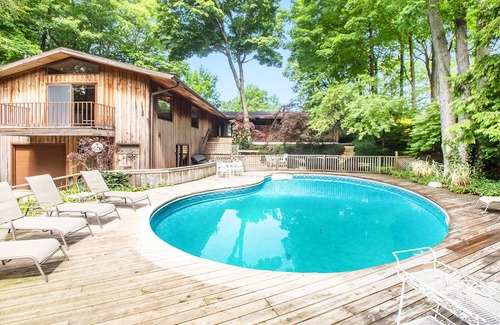 Harbert House | Dog-friendly lakefront house with private hot tub, outdoor pool, beach, WiFi